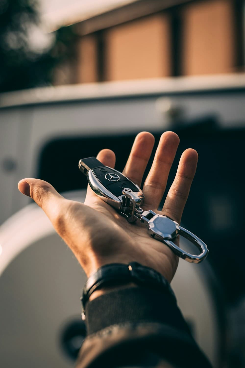 Keys going into a Faraday car-key pouch — the signal can't get out